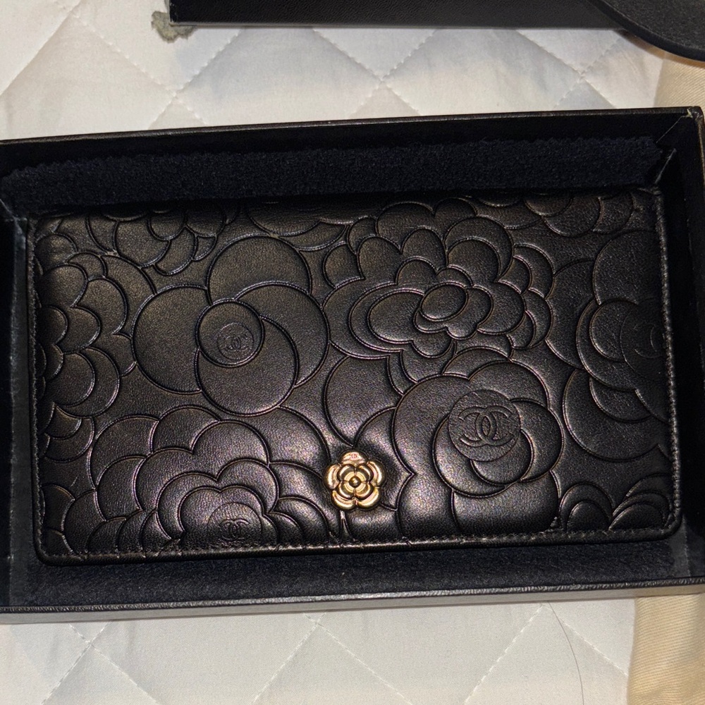 Chanel Black Camelia Embossed Floral Wallet.